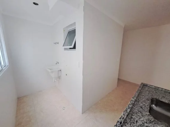Imagem Apartamento com 2 dormitórios à venda, 56 m² por R$ 320.000 - Caiçara - Praia Grande/SP