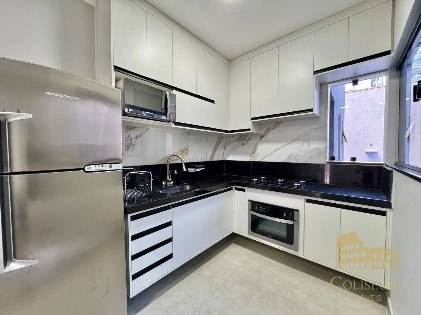 Imagem Casa com 3 dormitórios à venda por R$ 935.000,00 - Aviação - Praia Grande/SP