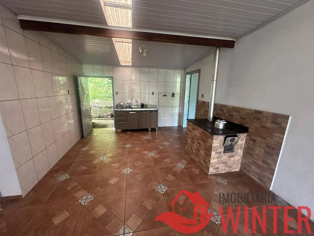 Imagem Casa com 4 dormitórios e galpão no Arroio Feliz.