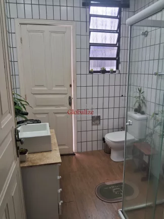 Imagem Sobrado para reforma em Santos na Vila Belmiro com 2 dormitórios, garagem e quintal nos fundos com piscina à venda por R$ 1.365.000,00