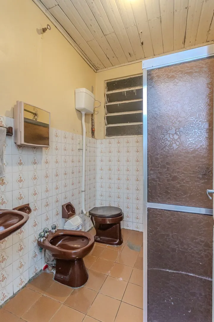 Imagem Casa no bairro Jardim Botânico de 3 dormitórios e garagem e terreno com 370m²