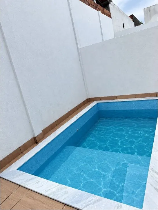 Imagem Casa com 3 quartos, suíte, piscina e 2 vagas no José Américo, João Pessoa. Conforto e praticidade para famílias e casais.