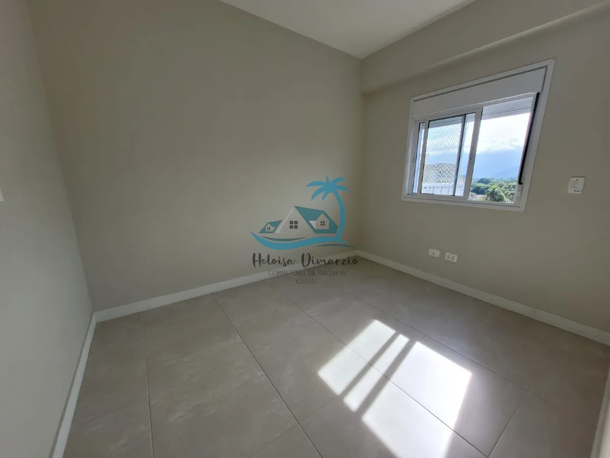 Imagem Excelente Apartamento com 3 dormitórios semi mobiliado e vista para o mar, a venda a 250 metros da orla de Itagua em Ubatuba.