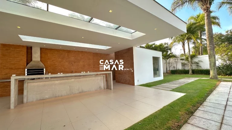 Imagem Imponente residência de luxo com 4 suítes na Barra da Tijúca, Rio de Janeiro - RJ: 3 salas, 6 vagas e 1.000m² de puro requinte!