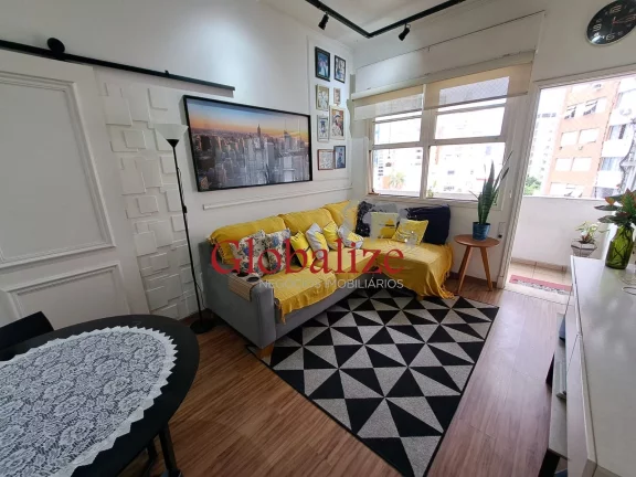 Imagem Apartamento à venda com 94m², 2 quartos, dependência, varanda de frente por R$580.000,00 no Gonzaga em Santos