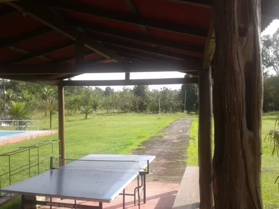 Imagem Lindo e confortável sítio na estrada de Itacoatiara , no km 58 , com casa , piscina e plantações