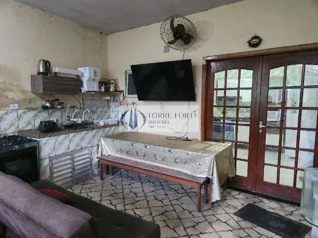 Imagem Casa com 2 suites 3 dormitorios 2 vagas na Aviação Praia Grande .
