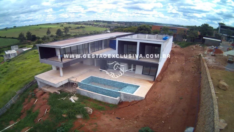 Imagem ALTO PADRÃO 5 SUÍTES PISCINA DE BORDA INFINITA LAZER COMPLETO CASA/CASEIRO