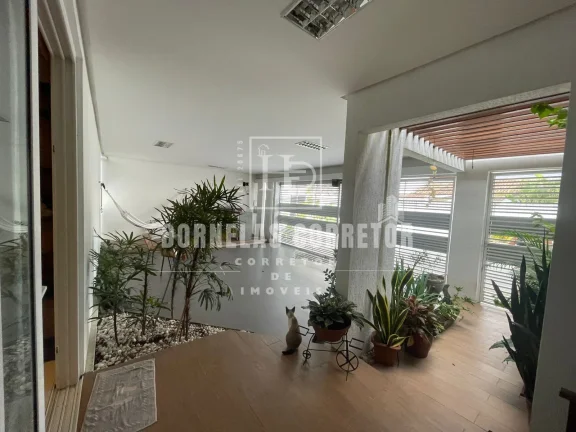 Imagem CASA COM 3 QUARTOS, 2 SUITES, TERRAÇO, GARAGEM, ESPAÇO GOURMET E ÁREA DE SERVIÇO