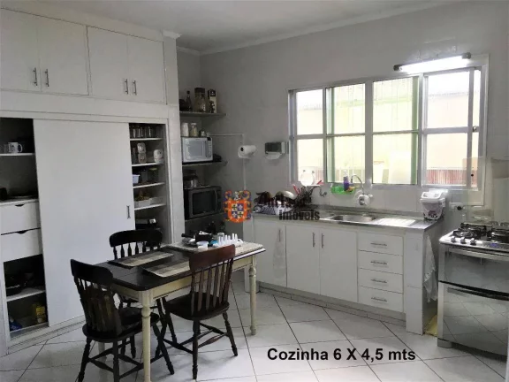 Imagem Casa com 3 dormitórios à venda, 180 m² por R$ 1.100.000 - Vila Guilhermina - Praia Grande/SP
