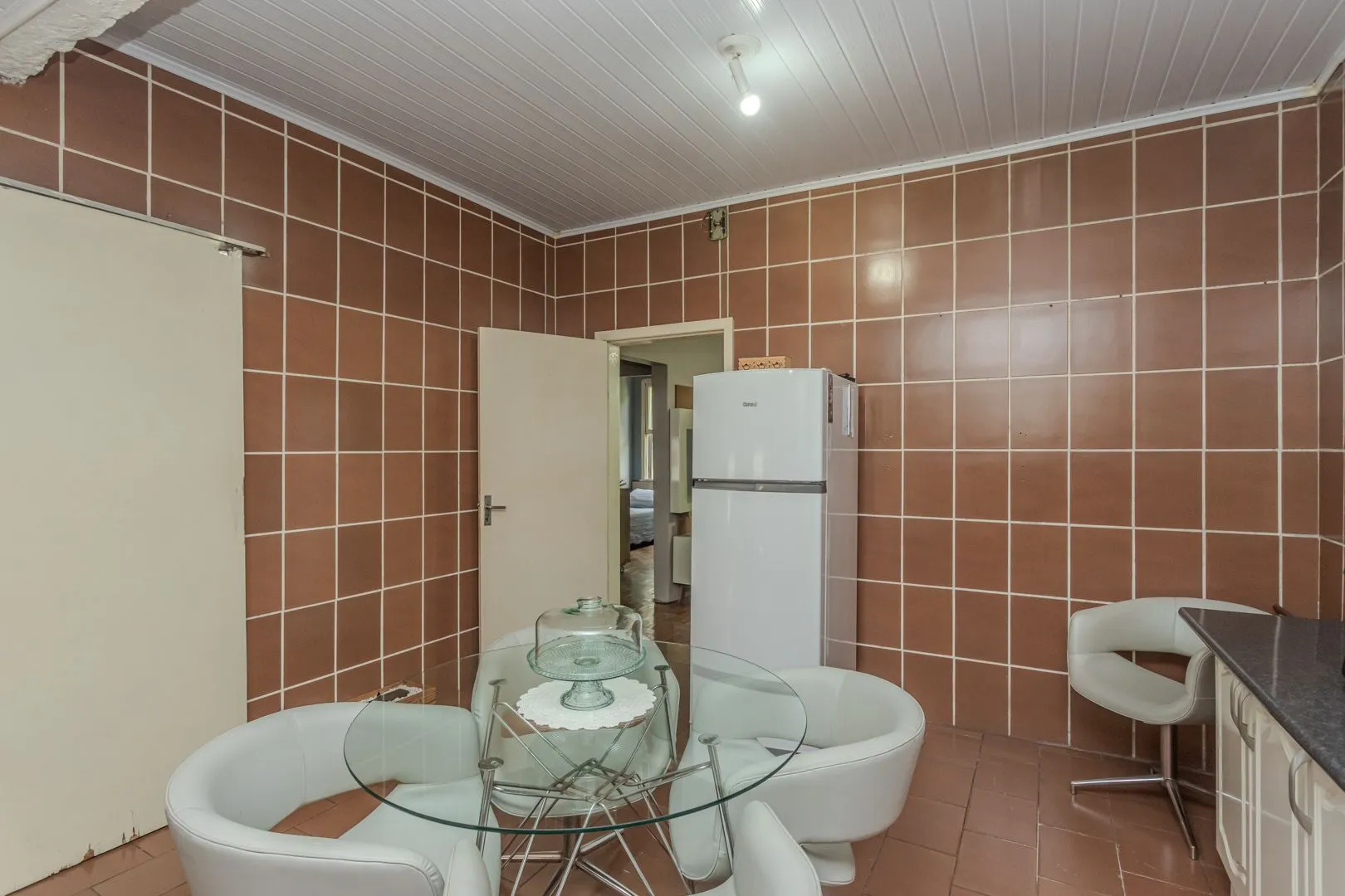 Imagem Casa no bairro Jardim Botânico de 3 dormitórios e garagem e terreno com 370m²