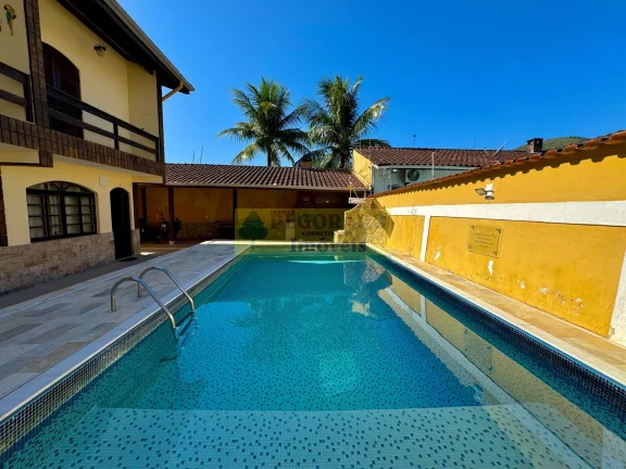 Imagem Sobrado de 2 quartos em condomínio fechado na Martim de Sá, Caraguatatuba-SP: 400mts da Praia, 76m², 1 vaga - Imperdível!