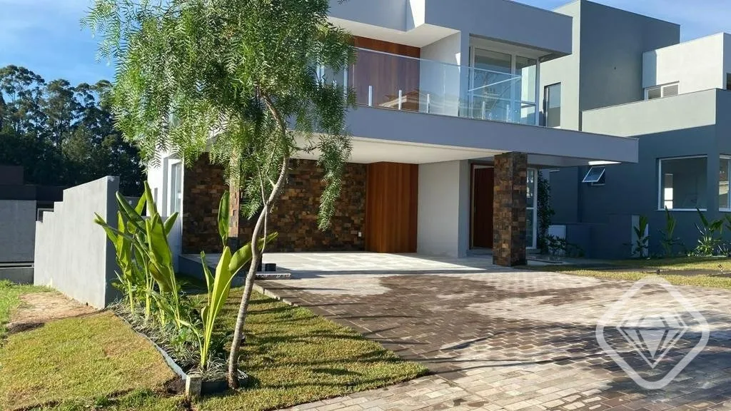 Imagem Esta residência de alto padrão é perfeita para quem valoriza conforto e lazer. 

São 298 m² pri...