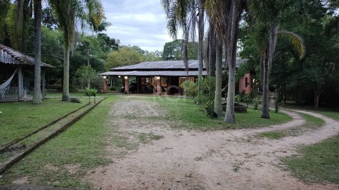 Imagem Sitio à venda no Lami, com 2 casas térreas, com 4 quartos cada uma