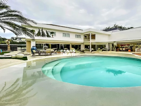 Foto do imóvel Paraíso em Malibu: Uma Residência Excepcional na Barra da Tijuca, Rio de Janeiro-RJ: 4 suítes, 3 vagas, 1.000 m² de área.