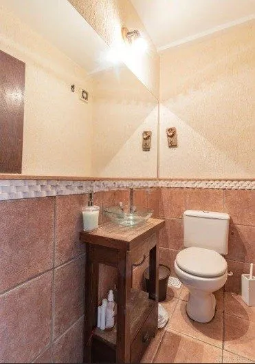 Imagem Casa de 3 dormitórios à venda em Ipanema, Porto Alegre.