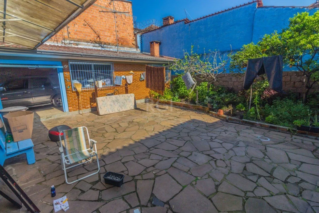 Imagem Casa para Venda - 165m², 3 dormitórios, 4 vagas - Santa Tereza