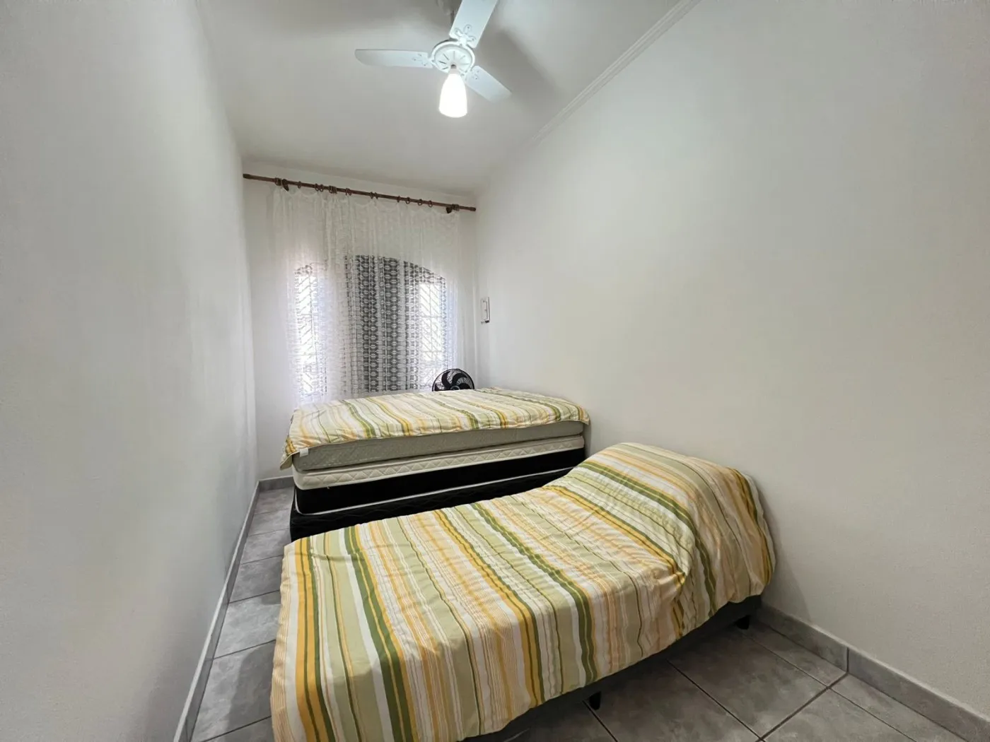 Imagem Casa para Venda em Praia Grande, Real, 2 dormitórios, 1 banheiro, 2 vagas