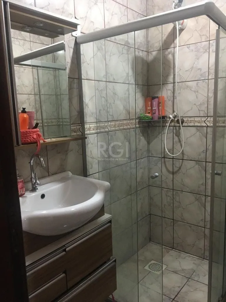 Imagem Sobrado para Venda - 92m², 3 dormitórios, 2 vagas - Restinga Nova