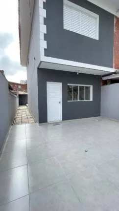 Imagem Sobrado com 2 dormitórios à venda, 79 m² por R$ 655.000,00 - Tupi - Praia Grande/SP