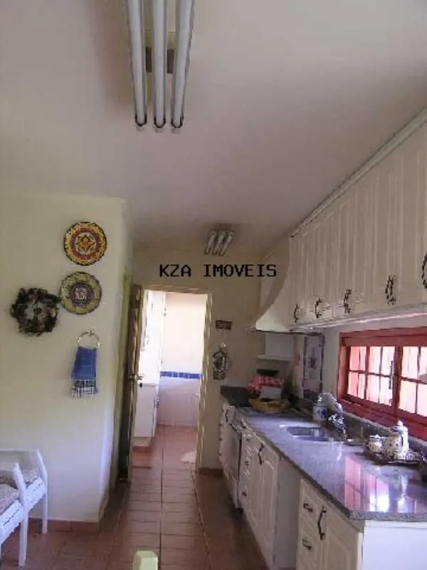 Imagem Imponente mansão de alto padrão em condomínio exclusivo de Valinhos-SP: 4 quartos, 2 suítes, 5 banheiros, 3 vagas, 450m².