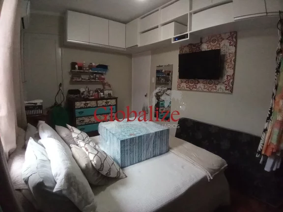 Imagem Casa em Vila à venda com 2 quartos, 2 banheiros, churrasqueira na Vila Mathias em Santos por R$426.000,00