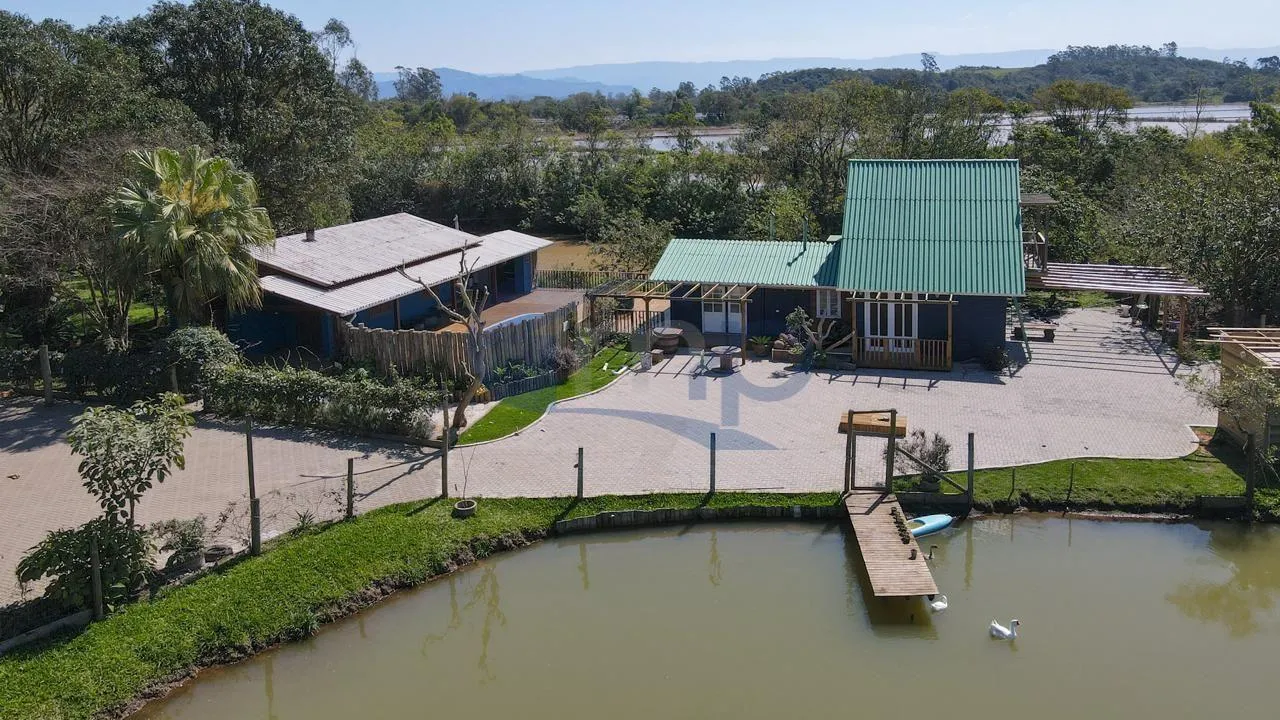 Imagem Sitio com chale e casa de alvenaria em Vila Sao Joao, Torres