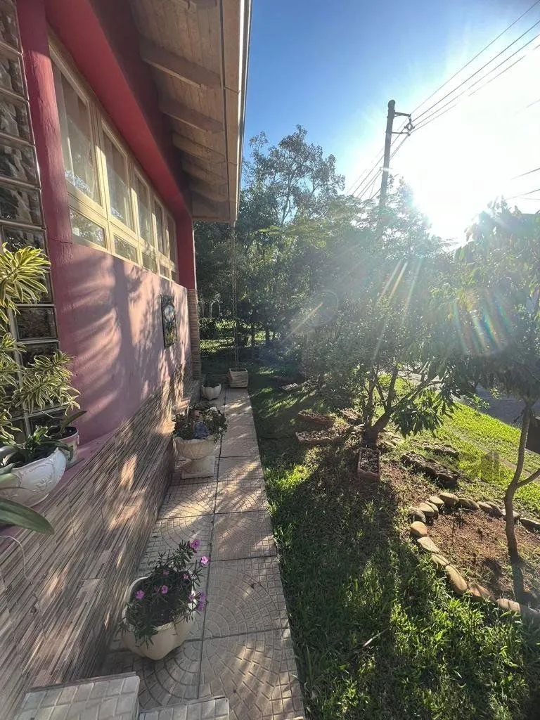 Imagem Casa com 4 quartos, suíte, churrasqueira, vaga de garagem, no bairro Elsa, Viamão/RS
