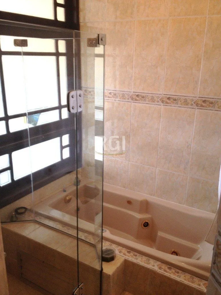 Imagem Casa Condominio para Venda - 350m², 4 dormitórios, sendo 1 suites, 2 vagas - Nonoai
