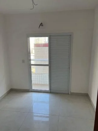 Imagem Apartamento com 2 dormitórios à venda, 74 m² por R$ 430.000,00 - Caiçara - Praia Grande/SP