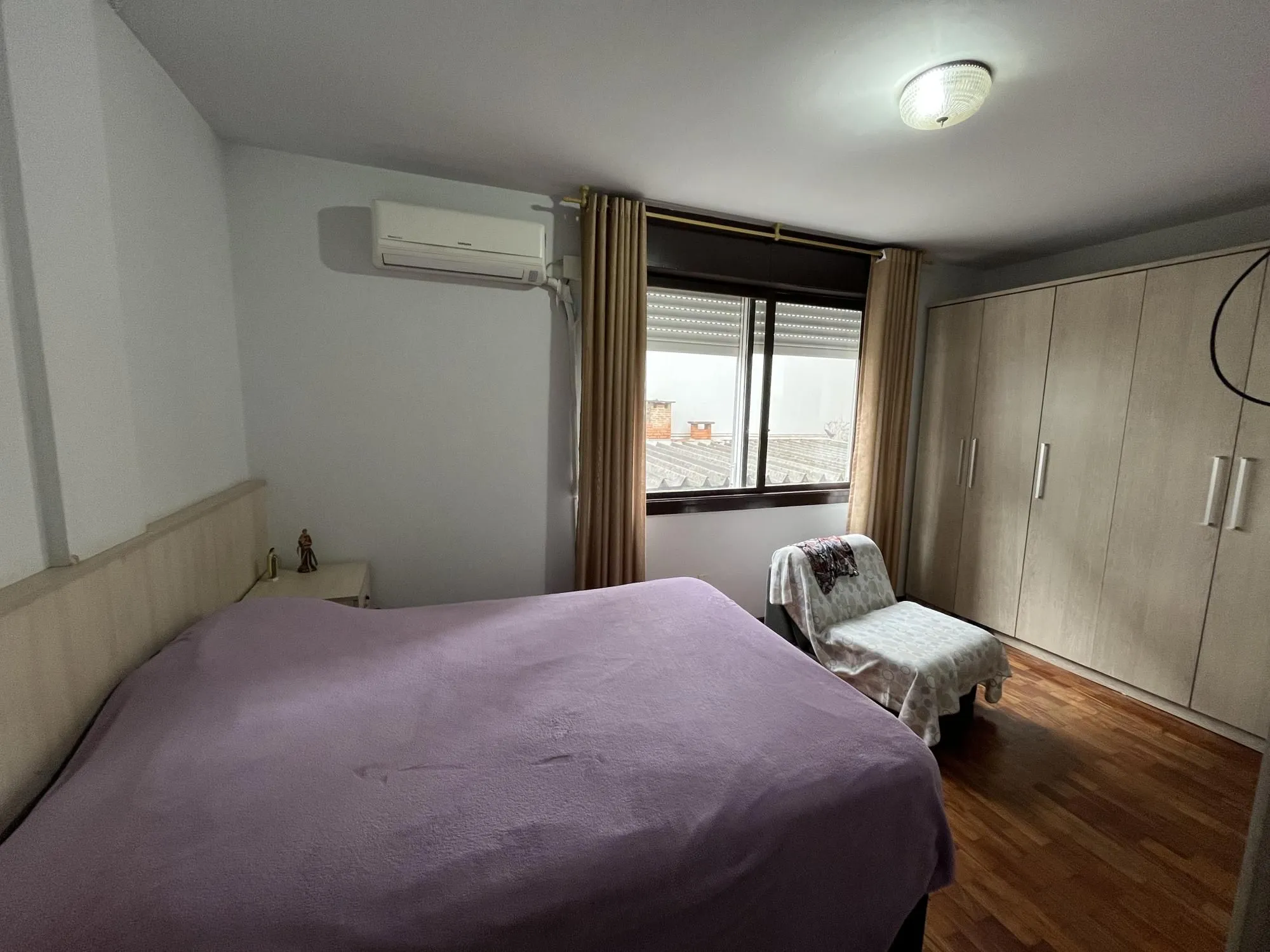 Imagem Apartamento de dois quartos com suíte no bairro Menino Deus em Porto Alegre