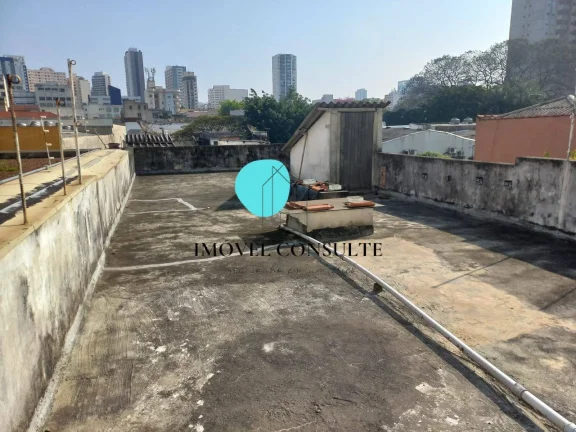 Imagem Oportunidade para Morar ou Investir! Sobrado Amplo com Renda de Locação.
