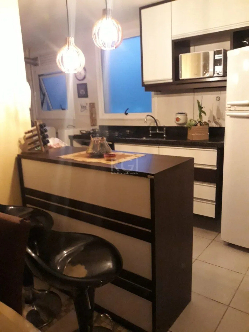 Imagem Apartamento de três dormitórios, suíte e uma vaga de garagem no bairro Cristo Redentor em Porto Alegre.