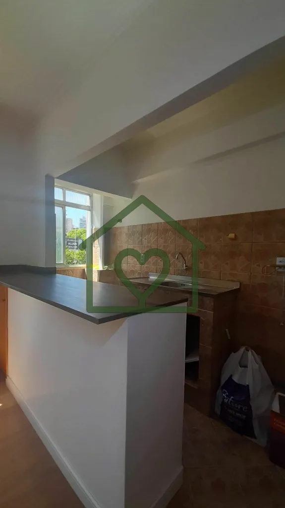 Imagem Apartamento de um dormitório à venda ou para alugar em Porto Alegre, com cozinha americana equipad...