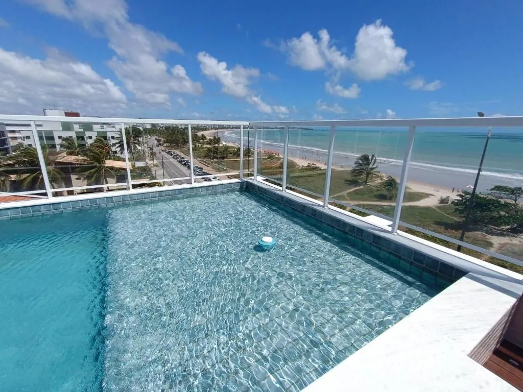 Imagem Flat mobiliado no Bessa com vista mar, piscina e garagem. Excelente para investir ou morar perto da praia.
