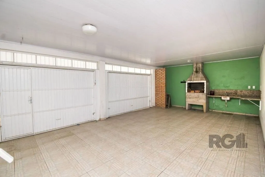 Imagem Excelente casa de 354m² com 5 dormitórios e 8 vagas.