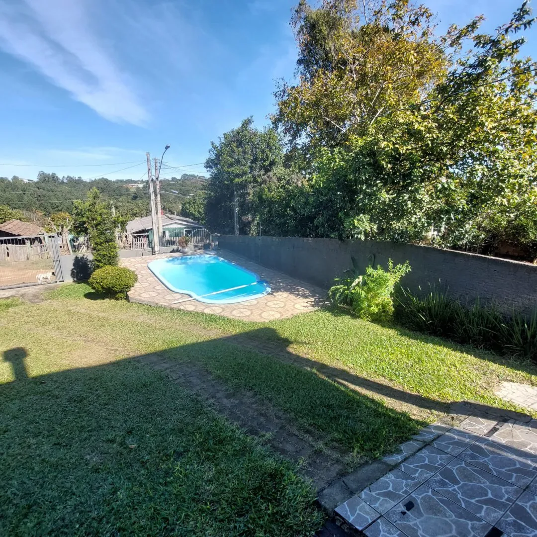 Imagem Casa com Piscina à Venda em Santo Onofre, Viamão