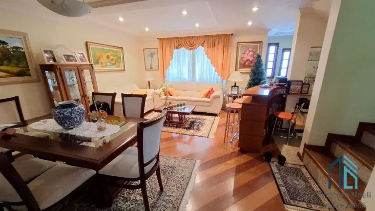 Imagem Casa com edícula, 04 quartos sendo 2 suítes, amplo terreno fundos, no Atuba em Curitiba PR