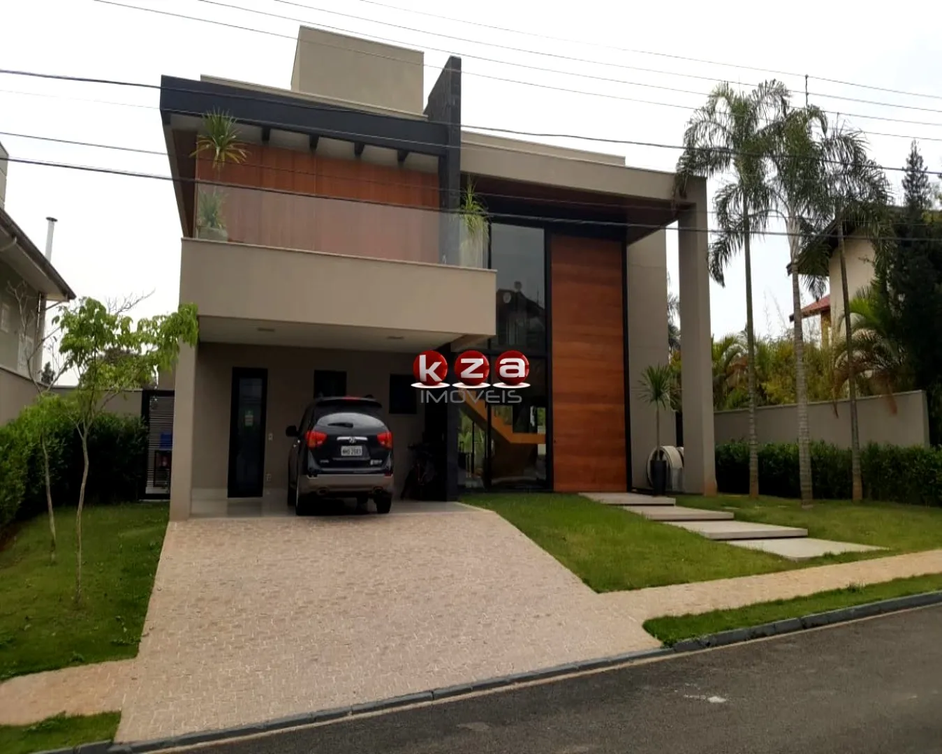 Imagem Luxuosa casa de alto padrão no Condomínio Portal do Lago em Valinhos-SP: 3 suítes, 3 salas, 5 banheiros, 4 vagas de garagem, 454m².