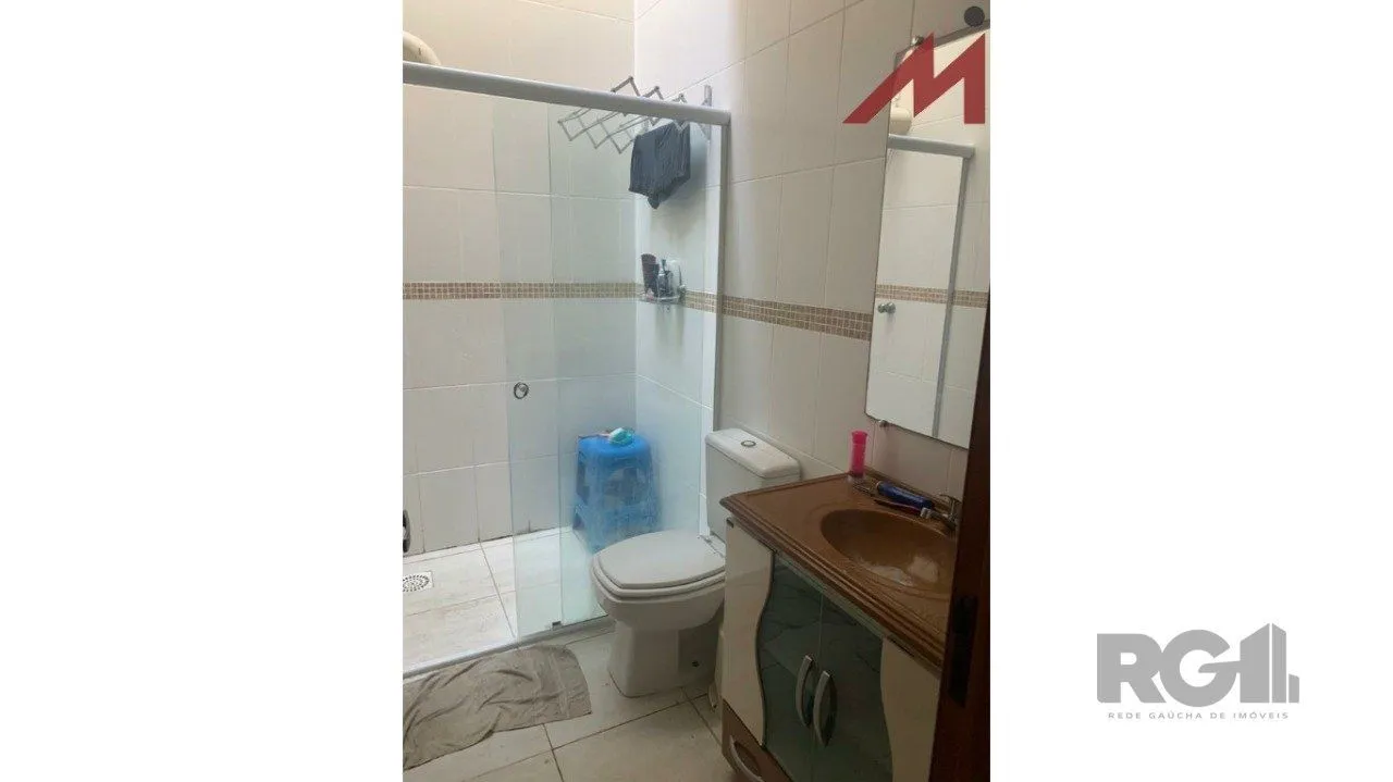 Imagem Sobrado em Trmandai com 2 suirtes, 2 banheiros, 1 vaga, churrasqueira e varanda.