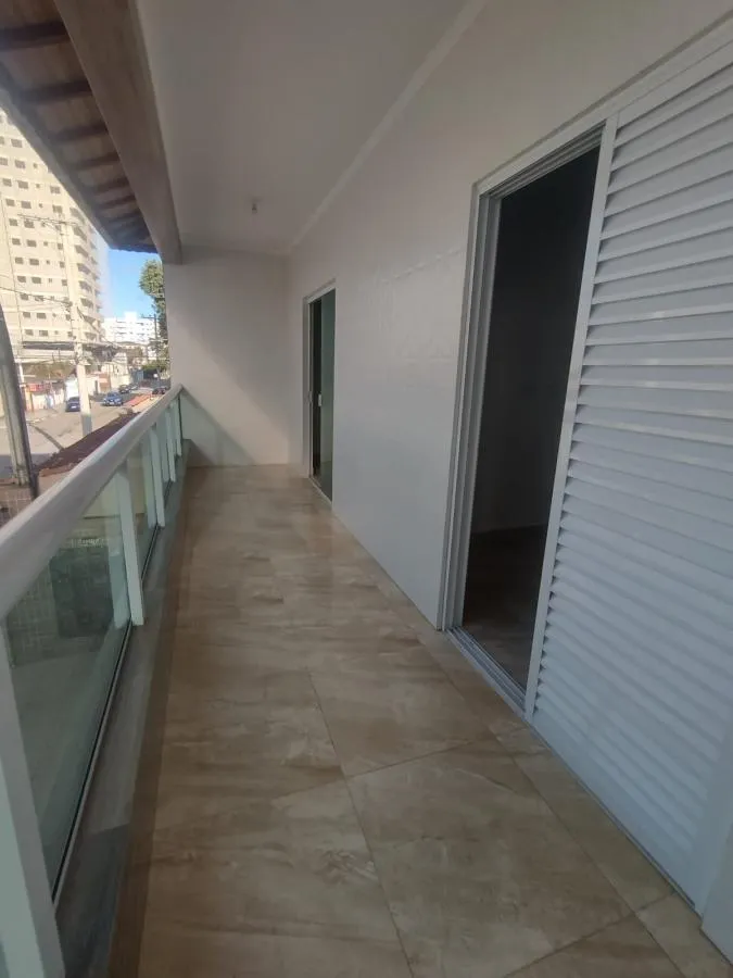 Imagem Casa para Venda em Praia Grande, Guilhermina, 3 dormitórios, 1 suíte, 1 banheiro, 1 vaga