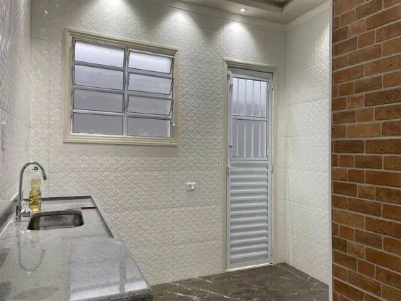 Imagem Casa com 2 dormitórios à venda, 130 m² por R$ 400.000 - Caiçara - Praia Grande/SP