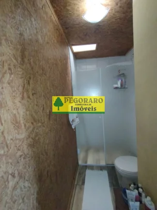 Imagem Casa à venda em Caraguatatuba-SP: 3 quartos, suíte, sala com vista para o mar e deck com hidro!