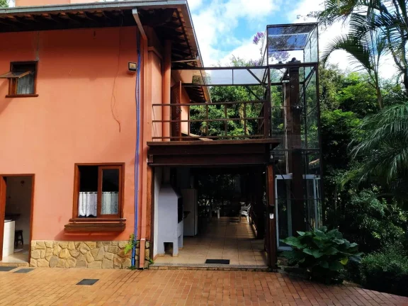 Imagem Casa de Condomínio com 4 Quartos e 5 banheiros à Venda, 1108 m²