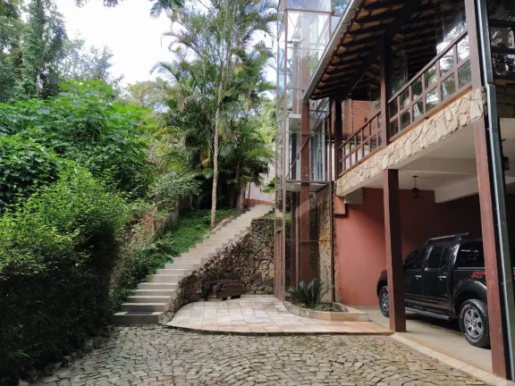 Imagem Casa de Condomínio com 4 Quartos e 5 banheiros à Venda, 1108 m²