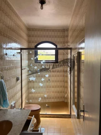 Imagem Casa para venda em São Vicente, 3 dormitórios.