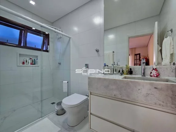 Imagem Casa à venda com 4 dormitórios 2 suítes 275m² de área útil, na Riviera de São Lourenço - Bertioga SP