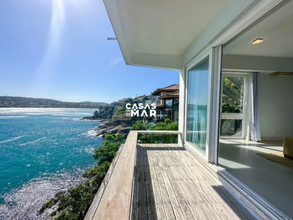 Imagem Luxuosa Casa Frente Mar em Búzios-Ferradura: 6 Suítes, Vista Deslumbrante, Piscina e Privacidade Total!