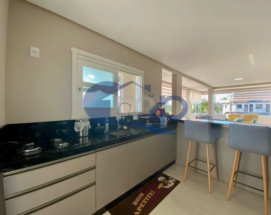 Imagem Apartamento 3 Dormitorios com Suite e Lareira a Venda no Stan - Torres/RS