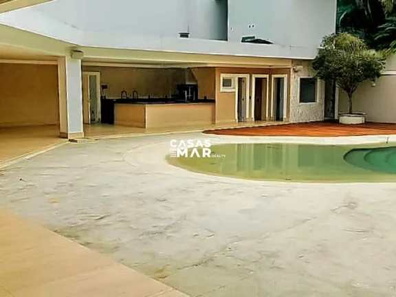 Imagem Paraíso em Malibu: Uma Residência Excepcional na Barra da Tijuca, Rio de Janeiro-RJ: 4 suítes, 3 vagas, 1.000 m² de área.